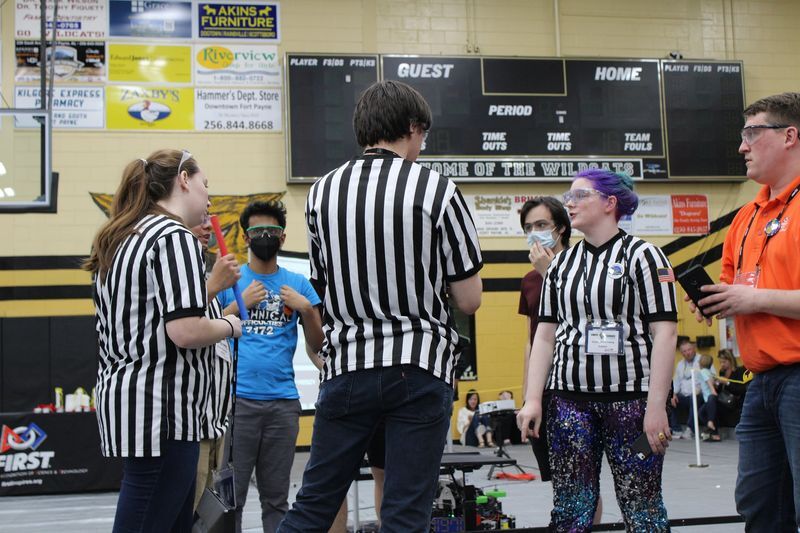 FTC Referees having a discussion
